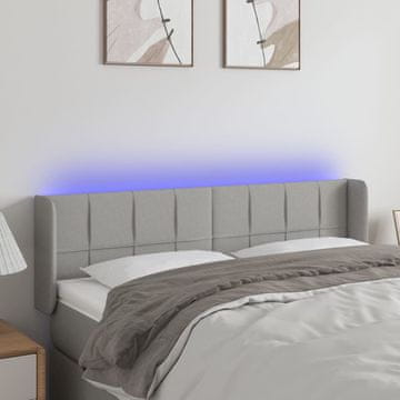 Vidaxl vidaXL Vzglavje postelje z LED svetlo sivo 147x16x78/88 cm blago