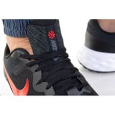 Nike Čevlji obutev za tek črna 40.5 EU Revolution 6 Next Nature
