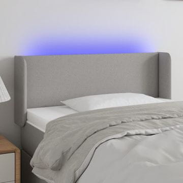 Vidaxl vidaXL Vzglavje postelje z LED svetlo sivo 83x16x78/88 cm blago