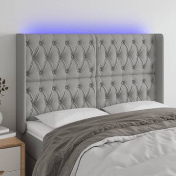 Vidaxl vidaXL Vzglavje postelje z LED svetlo sivo 147x16x118/128 cm blago
