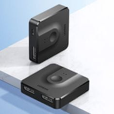 slomart ugreen cm430 razdelilnik signala 2x displayport (vhod) na 1x displayport (izhod) stikalo 4k/1080p črno (60622)
