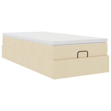 Vidaxl Otomanski posteljni okvir z vzmetnico krem 90x200 cm blago