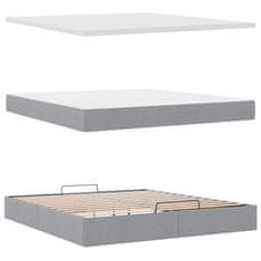 Vidaxl Otomanska postelja z vzmetnico siv 160x200 cm blago