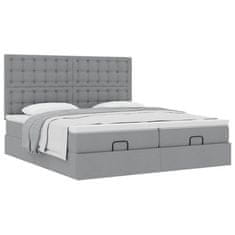 Vidaxl Otomanski posteljni okvir z vzmetnicami siv 180x200 cm blago