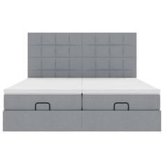 Vidaxl Otomanski posteljni okvir z vzmetnicami siv 180x200 cm blago