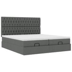 Vidaxl Otomanski posteljni okvir z vzmetnicami siv 180x200 cm blago