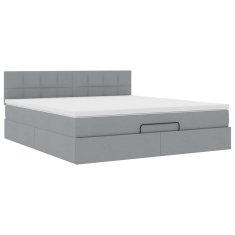 Vidaxl Otomanska postelja z vzmetnico siv 160x200 cm blago