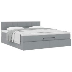 Vidaxl Otomanska postelja z vzmetnico siv 160x200 cm blago