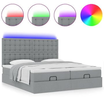 Vidaxl Otomanski posteljni okvir z vzmetnicami siv 180x200 cm blago