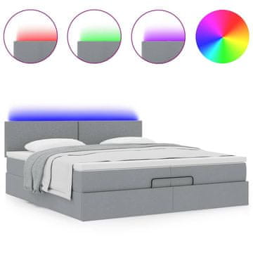 Vidaxl Otomanski posteljni okvir z vzmetnicami siv 200x200 cm blago