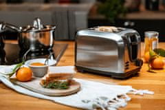 Adler Srebrni toaster Adler AD 3222 z roletnim stojalom, 7 stopnjami zapečenja, funkcijami ponovne peke in odmrzovanja, inox material.