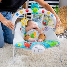 Baby Einstein Kick to It Neptun Glasbeni vibracijski ležalnik z lučkami do 9 kg