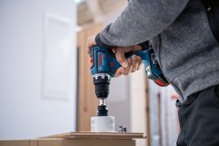 Bosch AKUMULATORSKI VRTALNIK GSR 18V-90C 0*AH L-BOXX