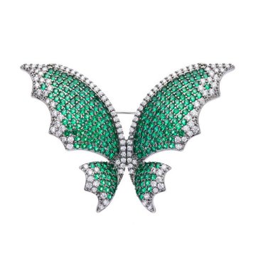 Oliver Weber Bleščeča broška z zelenimi kristali Metulj Chara 58055