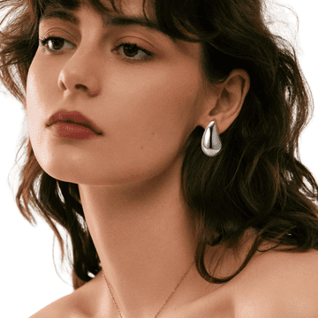 Camerazar Masivne srebrne uhane v obliki velikih kapljic iz kirurškega jekla, dolžine 2,5 cm