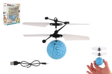 Teddies Helikopterska leteča žoga iz plastike 13x11cm sveti in se odziva na gibanje roke, kabel USB modre barve v škatli.