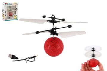 Teddies Helikopterska leteča žoga iz plastike 13x11cm sveti in se odziva na gibanje roke, kabel USB rdeče barve v škatli.