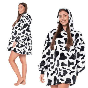 Nikcorp Topel pulover odeja 2v1 s kapuco in žepom, oversize kroj, debela sherpa podloga, vzorec kravjih lis, univerzalna velikost