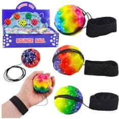 slomart Lunina žogica na elastiki za spretnost, 6,5 cm. Z vdolbinami za odličen oprijem. Trening koordinacije in refleksov!