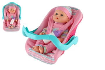 Teddies Otroška lutka 30 cm iz plastike v nosilcu/avtomobilskem sedežu s stekleničko v blister pakiranju