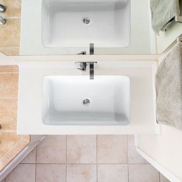 Northix Umivalnik iz porcelana Art umivalnik keramični umivalnik z izvlečnim odtokom 60 x 35 x 11 cm bel