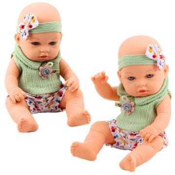 slomart Punčka LEAN TOYS 'Bobas', v zelenem cvetličnem kompletu in s trakom za lase