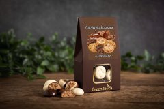 Piškoti z začimbami, preliti s čokolado 100 g piškotov, prelitih s čokolado, v škatli