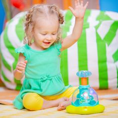 Bright Starts Glasbena svetleča igrača Press&amp;Glow Spinner 6m+