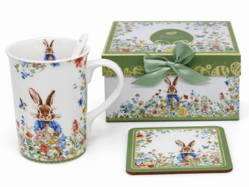 Porcelanasta skodelica z velikonočnim zajčkom, žličko, podstavkom in darilno škatlo