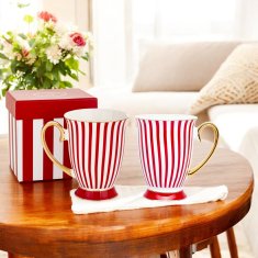 Porcelanasta skodelica v rdeče-belo-zlati darilni škatli