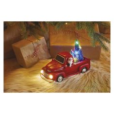 Emos LED dekoracija Božiček v avtu z božičnimi drevesci, 10 cm, 3x AA, notranja, večbarvna