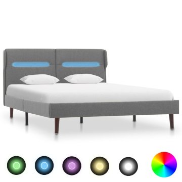 Vidaxl Posteljni okvir z LED osvetlitvijo svetlo sivo blago 120x200 cm