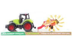 Traktor z obračalnikom sena