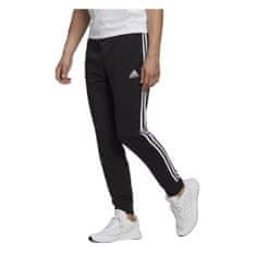 Adidas Hlače obutev za trening črna 164 - 169 cm/S Essentials Tapered Cuff 3 Stripes